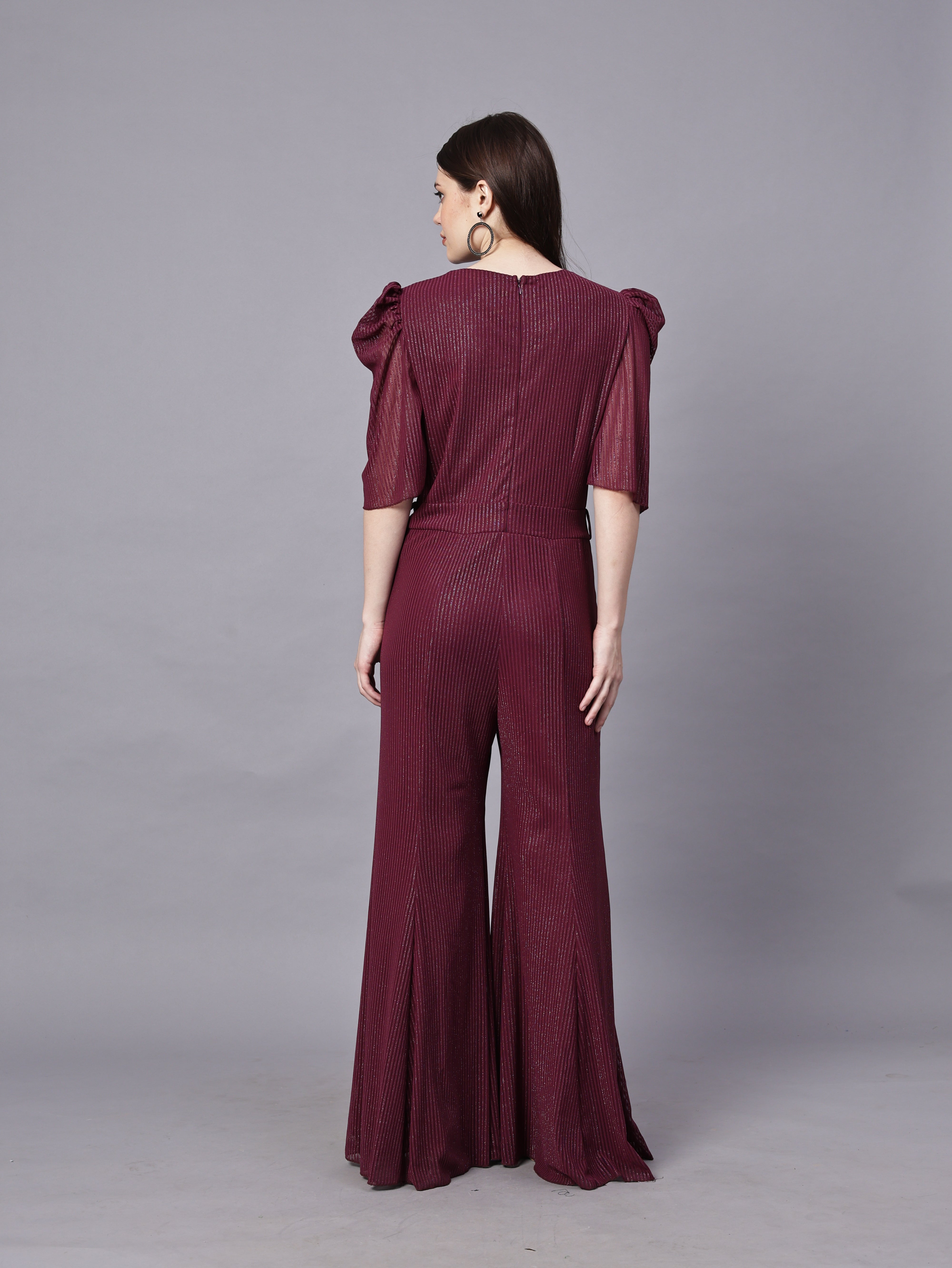 POWERNET CROSS NECK JUMPSUIT WITH BELT