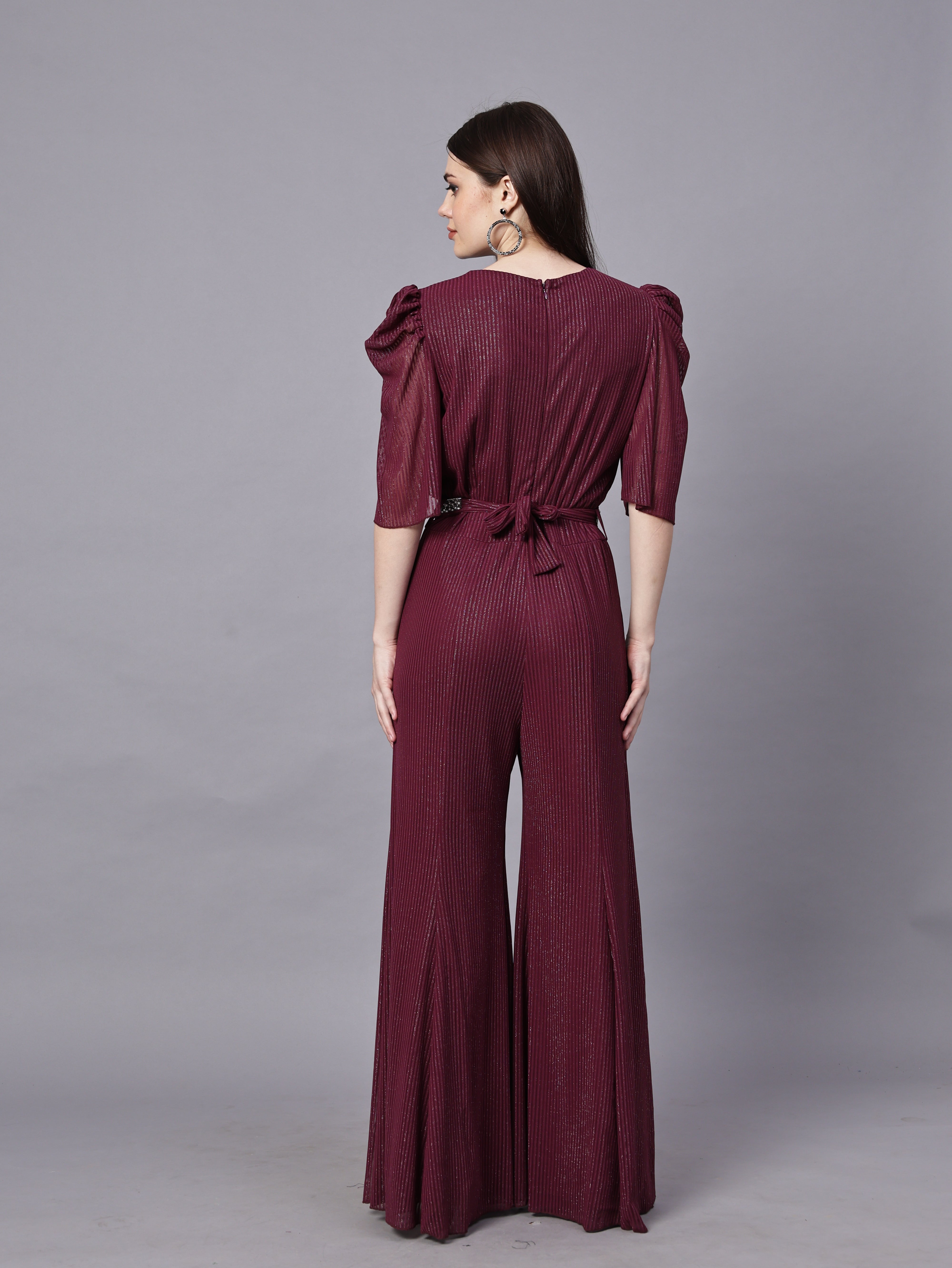 POWERNET CROSS NECK JUMPSUIT WITH BELT